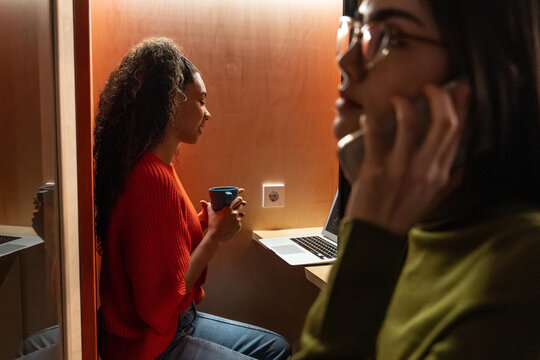 Young professionals collaborating in modern coworking space