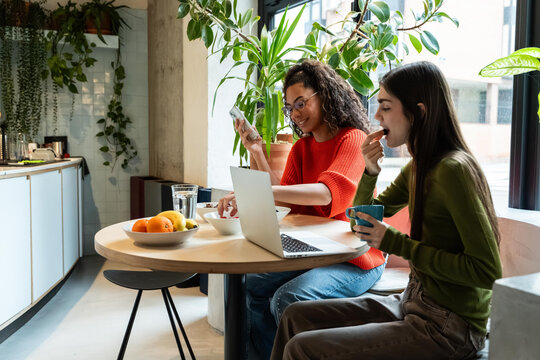 Team enjoying a break in a vibrant coworking space