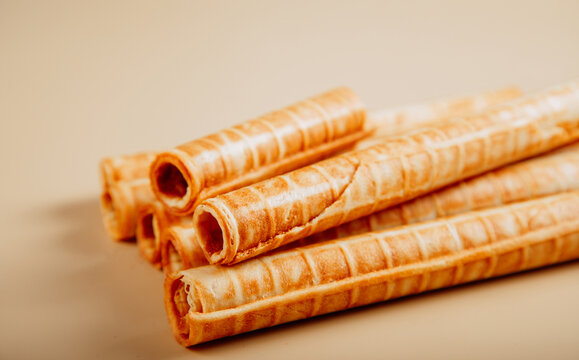 Crisp wafer tubes on a neutral background