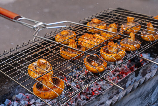 Grilled mushrooms on open fire barbecue
