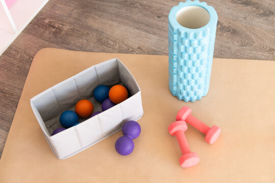 Fitness accessories on yoga mat for home exercise