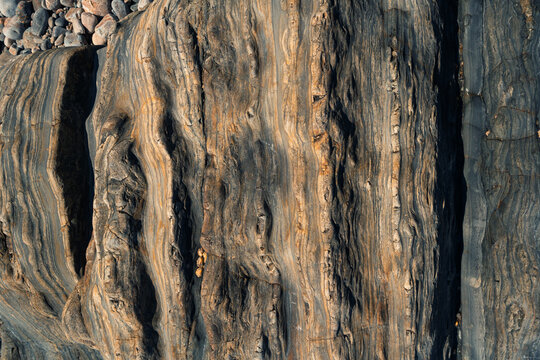 Close-up of textured rock surface with natural layers