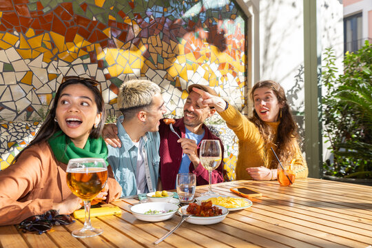 Joy of sharing tapas with friends outdoors