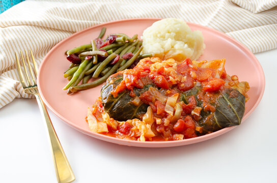 Cabbage rolls with mashed potatoes and green beans