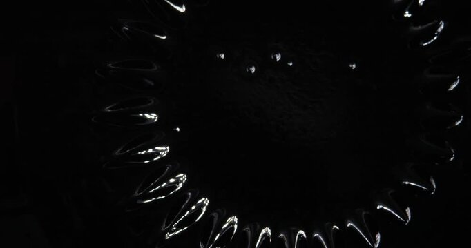 Magnetic fluid. Ferrofluid. Black liquid surface. Abstract background.