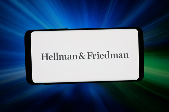 Stuttgart, Germany - 03-18-2026: In this photo illustration, the logo of investment company Hellman and Friedman (HF) is displayed on a smartphone in front of abstract background on computer screen.