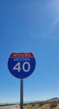 Arizona Interstate 40 Sign Against A Vast Blue Sky