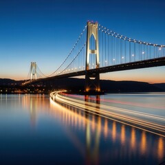 Fototapeta premium Captivating Suspension Bridge Illuminated Against a Twilight Sky