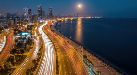 Fototapeta premium Cityscape Highway Lights Reflecting On The Water Under The Full Moon