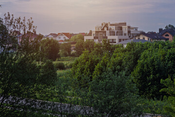 Obraz premium A rustic-style wooden and brick house on a village street