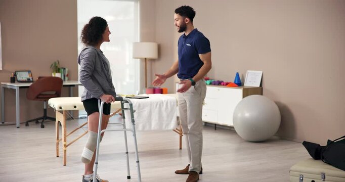 Walking frame, woman and handshake with physiotherapist for greeting, welcome or meeting. Amputee, physical therapy or shaking hands with person with disability in rehabilitation for health in clinic