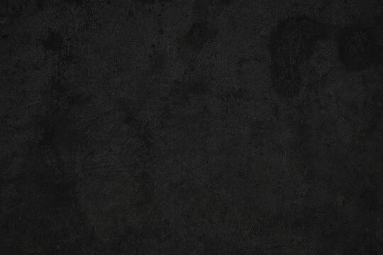 Dark grunge black textured background