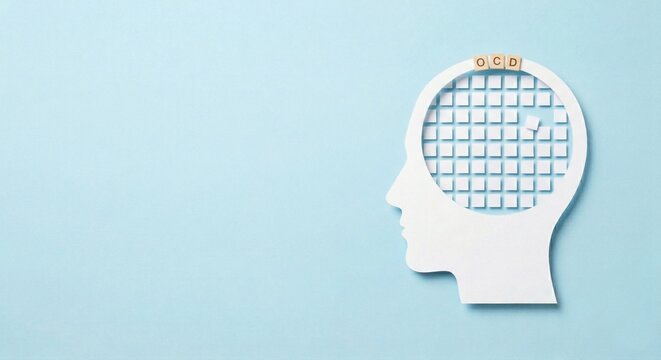 OCD awareness concept with rigid grid and misplaced tile in human head profile