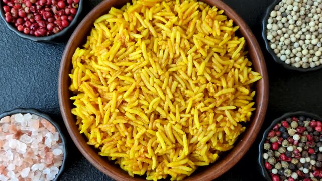 Kabsa or haneeth, an Arabic dish with rice and chicken, salt, and spices. Kabsa or haneeth as a food background for your design
