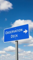 Fototapeta premium Directional Sign For Observation Deck Under A Blue Sky With Clouds