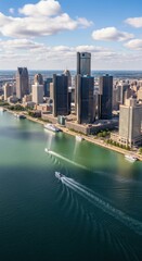 Fototapeta premium Dynamic Cityscape Skyline Riverfront With Boats Under Bright Sunny Skies
