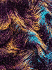 Obraz premium Vibrant multicolored faux fur texture with purple, blue, and yellow hues in abstract pattern design for textiles and fashion backgrounds