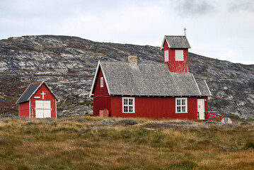 Ilimanaq, Disko Bay, Greenland - Remote Red Church in Ilimanaq Greenland with Autumn Tundra and Arctic Mountains Landscape © SJ Falcetta Images