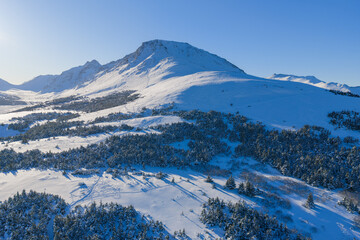 Aerial view of the snowy peak of Flattop Mountain in Anchorage, Alaska. © Mark