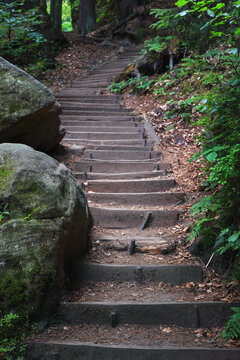 Natural landscape - view of stairs between rocks on a mountain path in Saxon Switzerland, Germany