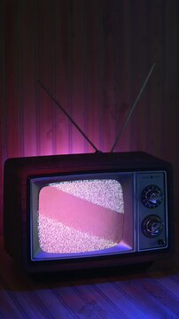 Analog Retro TV displaying static on Wood Paneling Background and Surface Atmosphere Vertical