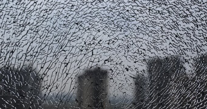 Broken window glass of modern apartment