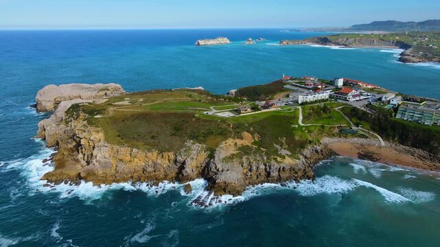 Aerial Drone View of Suances Coastal Cliffs with Atlantic Ocean Waves, Turquoise Water and Scenic Cantabrian Landscape. High quality 4k footage