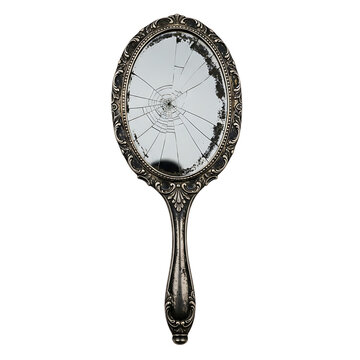 A broken antique hand mirror with a cracked glass on transparent background