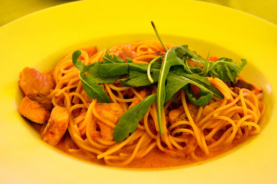 Plate of pasta with salmon.