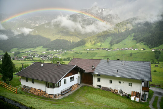 Rainbow over Stubaital valley in Tirolean Alps in Austria.