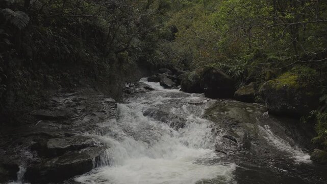 A medium drone shot of the Hanakapi'ai stream, Kauai, Hawaii
