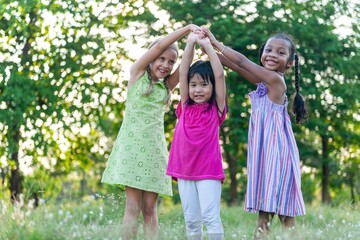 Fototapeta premium Joyful children playing outdoors photo