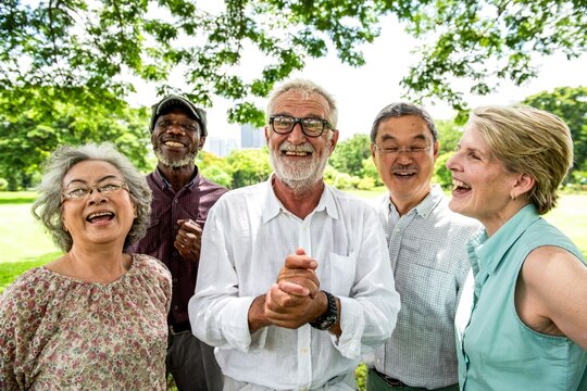 Diverse seniors enjoying outdoor laughter
