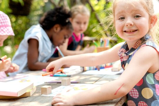 Children enjoying outdoor art activities.