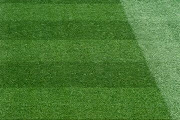 Background Texture of International-Standard Football Pitch with Striped Grass and Field Lines Under Clear Conditions © minortica7