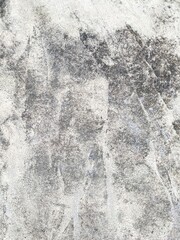 Obraz premium Gritty and distressed concrete texture, an abstract weathered surface perfect for industrial backgrounds, grunge overlays, and urban design projects
