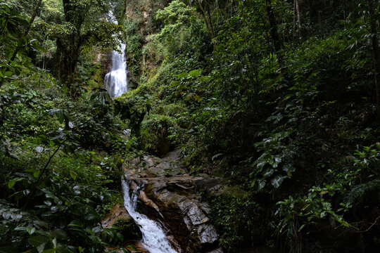 Pristine Tropical Waterfall Cascada Norte in Waraira Repano National Park. Hidden gem along the Rio Norte river in the lush mountains of Guatire, Miranda, Venezuela