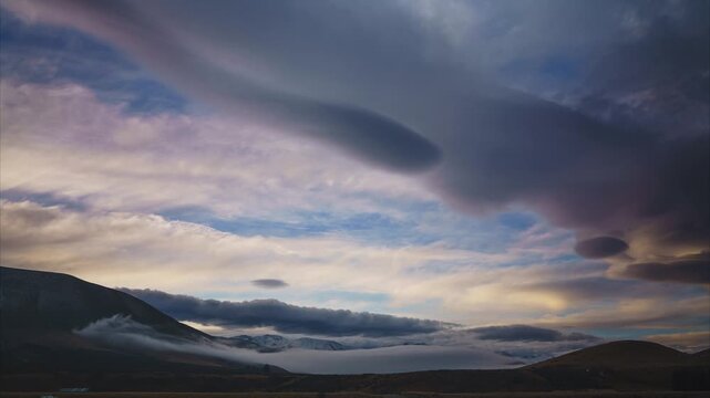 Timelapse of Dramatic Lenticular Clouds Over Ben Ohau Range with Rolling Mist in the Mackenzie Basin New Zealand