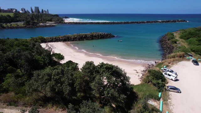 Parked Cars On A Sandy Parking Area Near The Shoreline Of Marlos Beach In Fingal Head, NSW, Australia. - aerial shot