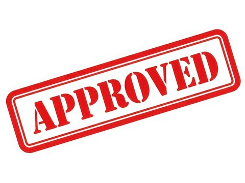 A bold red stamp with the word approved in white capital letters