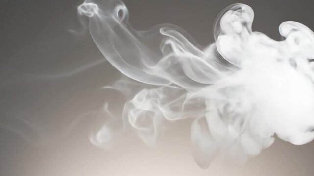 Close-up shot of white smoke swirling against a gradient gray background with a subtle transition to beige, captured with a shallow depth of field.