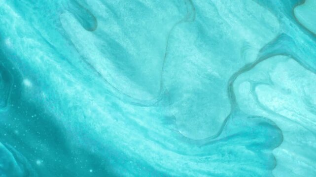 Different shades of blue liquids interacting to create organic fluid patterns. Abstract representation of ingredients being combined for pharmaceutical or cosmetic testing.