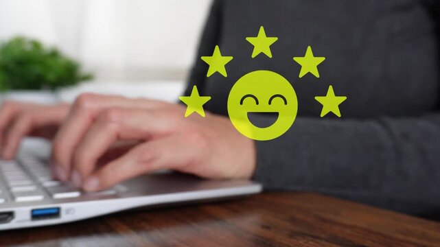 Close-up of a woman's hand working on a computer, pointing at a five-star animation with a happy and satisfied expression.