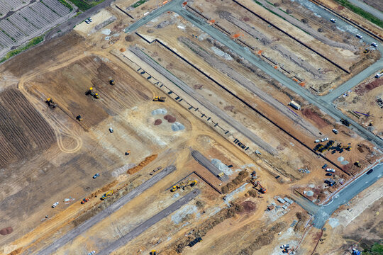 Officer Victoria aerial view large construction site with earthworks and heavy machinery