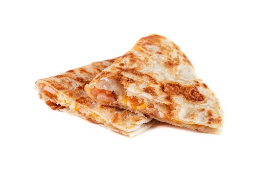 Delicious quesadilla with shrimp and melted cheese side view close up on white background with copy space savory mexican snack food for take out