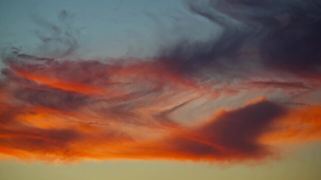 Glowing Sunset Clouds with Dramatic Texture in Evening Sky.