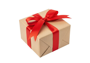 Fototapeta premium A square gift box wrapped in rustic brown paper tied with a vibrant red satin ribbon and festive bow
