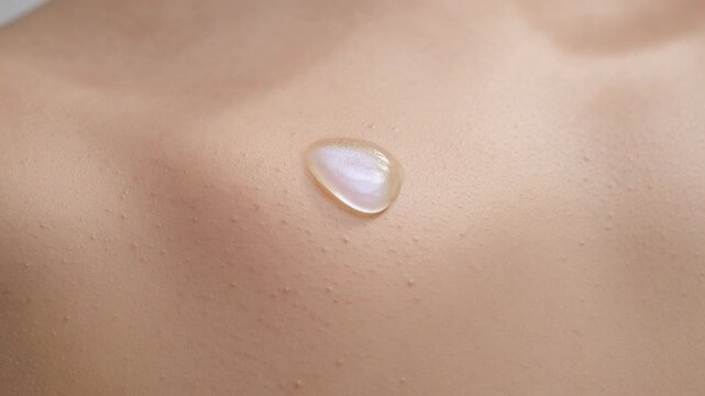 Serene iridescent gemstone gently rests smooth skin, revealing soft, translucent glowing effect. Crystal delicate shimmer creates peaceful reflection, enhancing natural beauty and self care