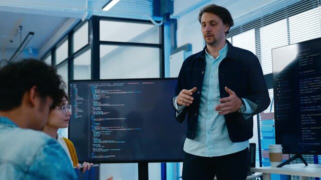 Diverse creative team of programmer develop ai assistant project together.Software engineer brainstorm about brain android robot,coding language,designer,artificial virtual intelligence with big data