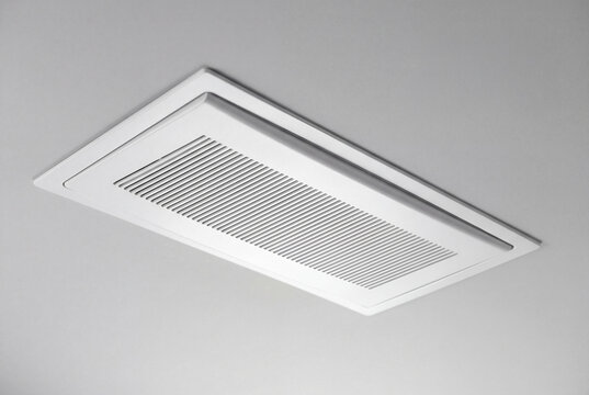 White rectangular HVAC ceiling air vent cover close up